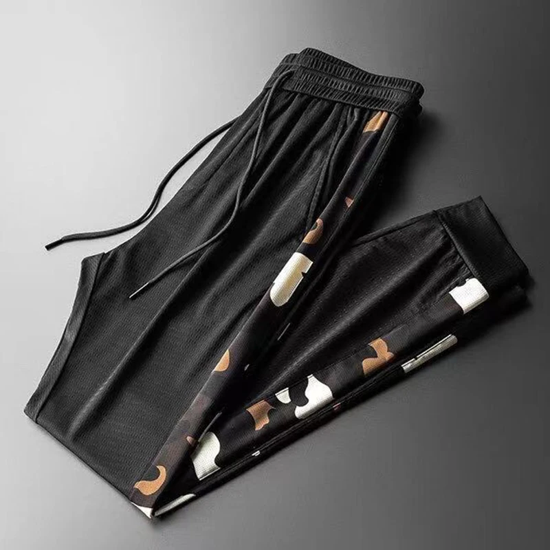 

2021 summer new men's short-sleeved casual sports suit men's camouflage mesh breathable trousers two-piece suit