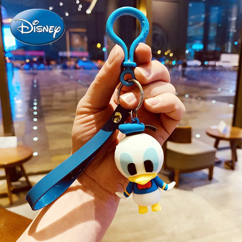 

Disney Winnie the Pooh schoolbag small pendant doll men and women car chain ring couple bag pendant doll keychain