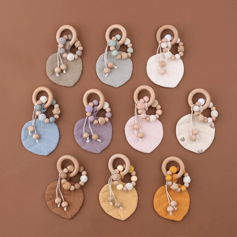 Детское деревянное кольцо прорезыватель с листьями абсорбирующее тканевое