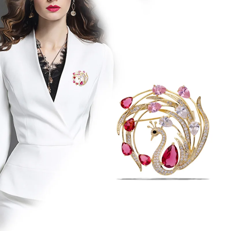 

Japan and South Korea new brooch female bronze zircon peacock feather brooch versatile water drop jewelry silk scar