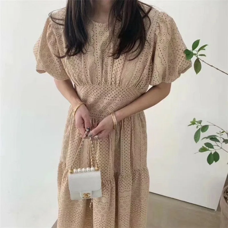 

2021 round neck solid color temperament hollow lace dress women