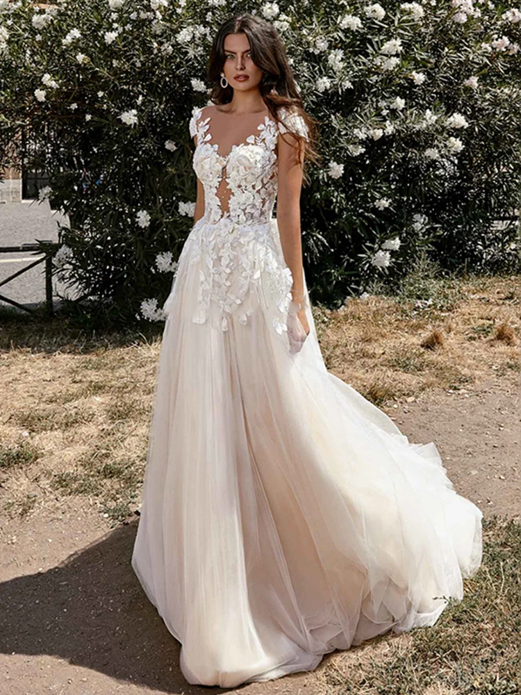 

Booma Beach Wedding Dresses Appliques Lace Bride Dresses Cap Sleeve Boho Bridal Gown Illusion Champagne Princess Party Gowns