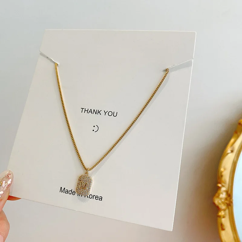 

Light luxury fashion design sense M letter zircon pendant titanium steel necklace women