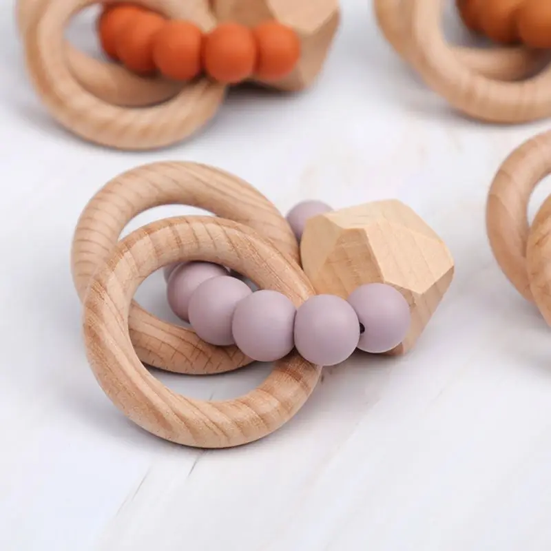 

Wooden Rattle Beech Hand Teething Ring Baby Teether Play Gym Montessori Toy