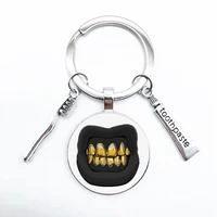 hip hop round keychain black mouth and gold teeth toothpaste toothbrush pendant key ring stylish personality gift