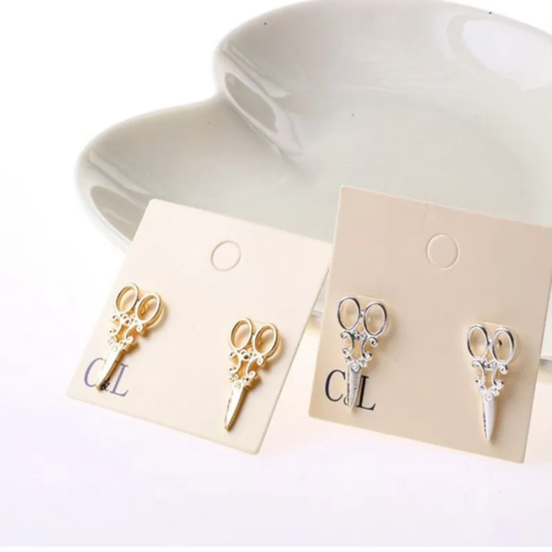 

Korean version of hollow small scissors earrings simple fashion earrings women's accessories earrings 2021 trend gifts