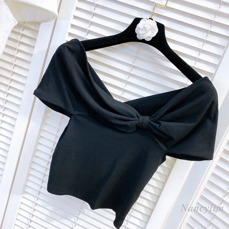 Camiseta de verano para mujer, Top corto de algodón elástico con lazo grande y hombros irregulares, ajustada, manga corta, blanco y negro, 2021
