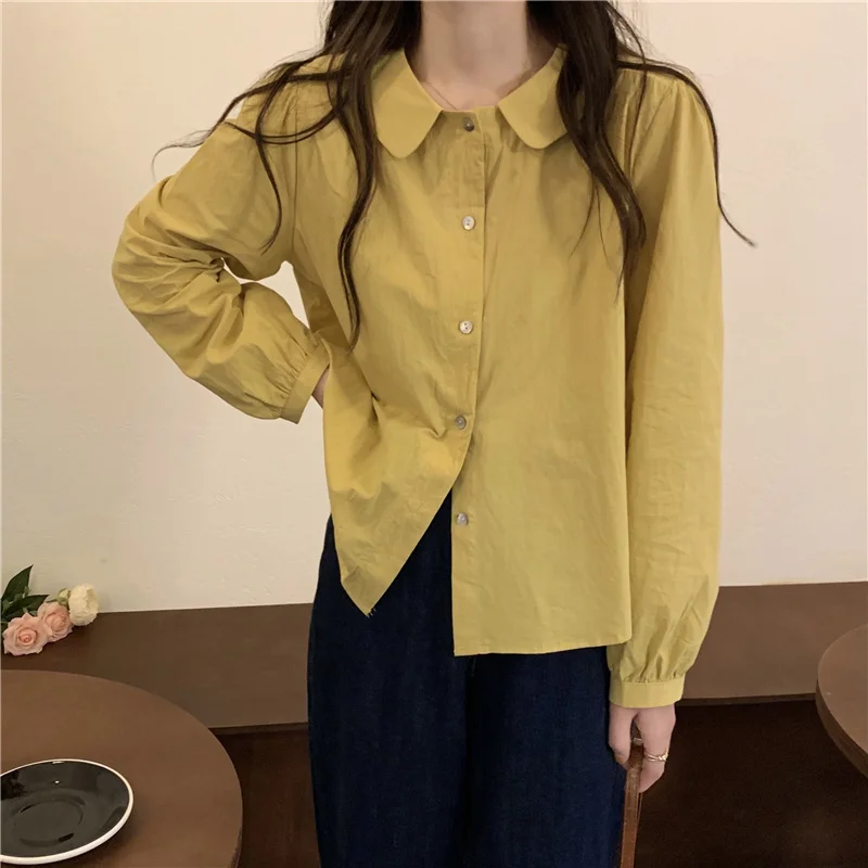 

Shirt female design sense niche 2021 spring and autumn new French doll collar loose and long sleeved shirt