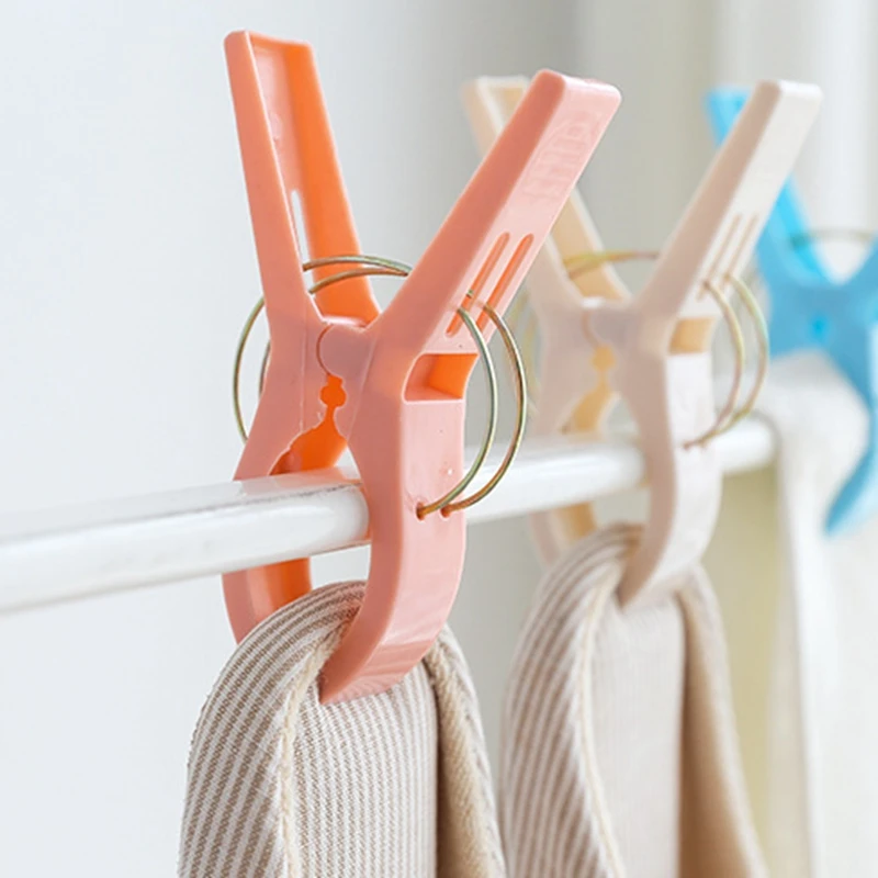 

Random 4Pcs/Set Hanger Clips Laundry Clothes Practical Beach Towel Pins Spring Clamp Large Clips for Clothes Gadgets for Home