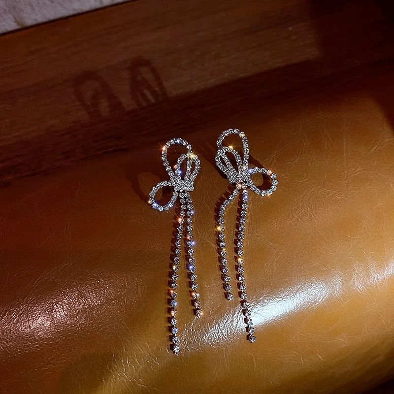 

2021 Новые блестящие Висячие серьги Стразы с бантом для женщин длинные серьги с кисточками корейские модные ювелирные изделия для вечерние Р...