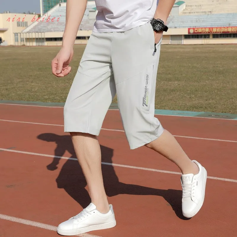 

Pants men's 2021 summer Korean thin casual breathable Capri beach pants summer loose large shorts men's fashion