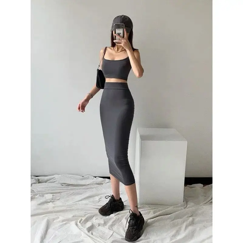 

American vintage suit women suspender tops + sheath mid-length short skirt 2022 summer new solid color sleeveless two-piece suit