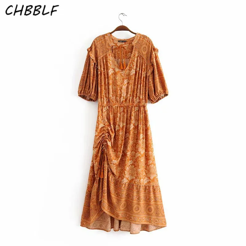 

Женское винтажное платье-миди с V-образным вырезом и поясом на резинке