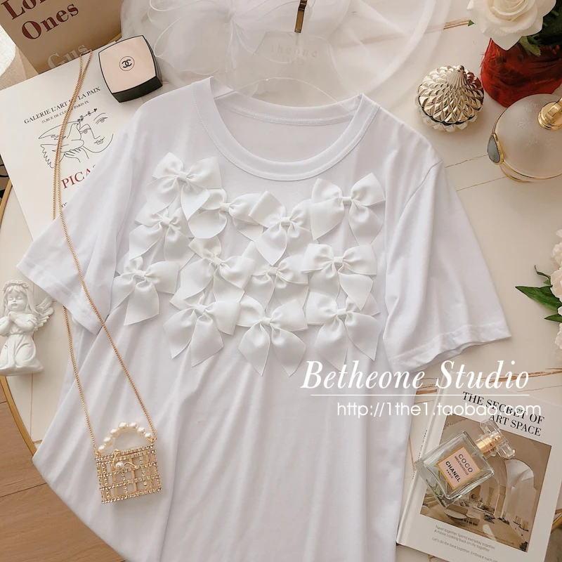 

Sweet Girl Solid Color Short Sleeve Bow Decoration T-shirt Women's Casual Loose All-match Round Collar Top 2021 Spring