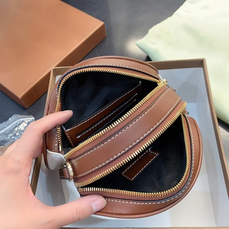 

100779 2021New style women's fashion round cake BAG canvas slant span bag