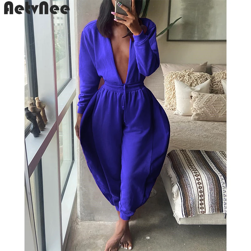 

Женский однотонный комбинезон AetvNee, Осенний комбинезон с длинным рукавом, глубоким V-образным вырезом, поясом и широкими штанинами, 2021