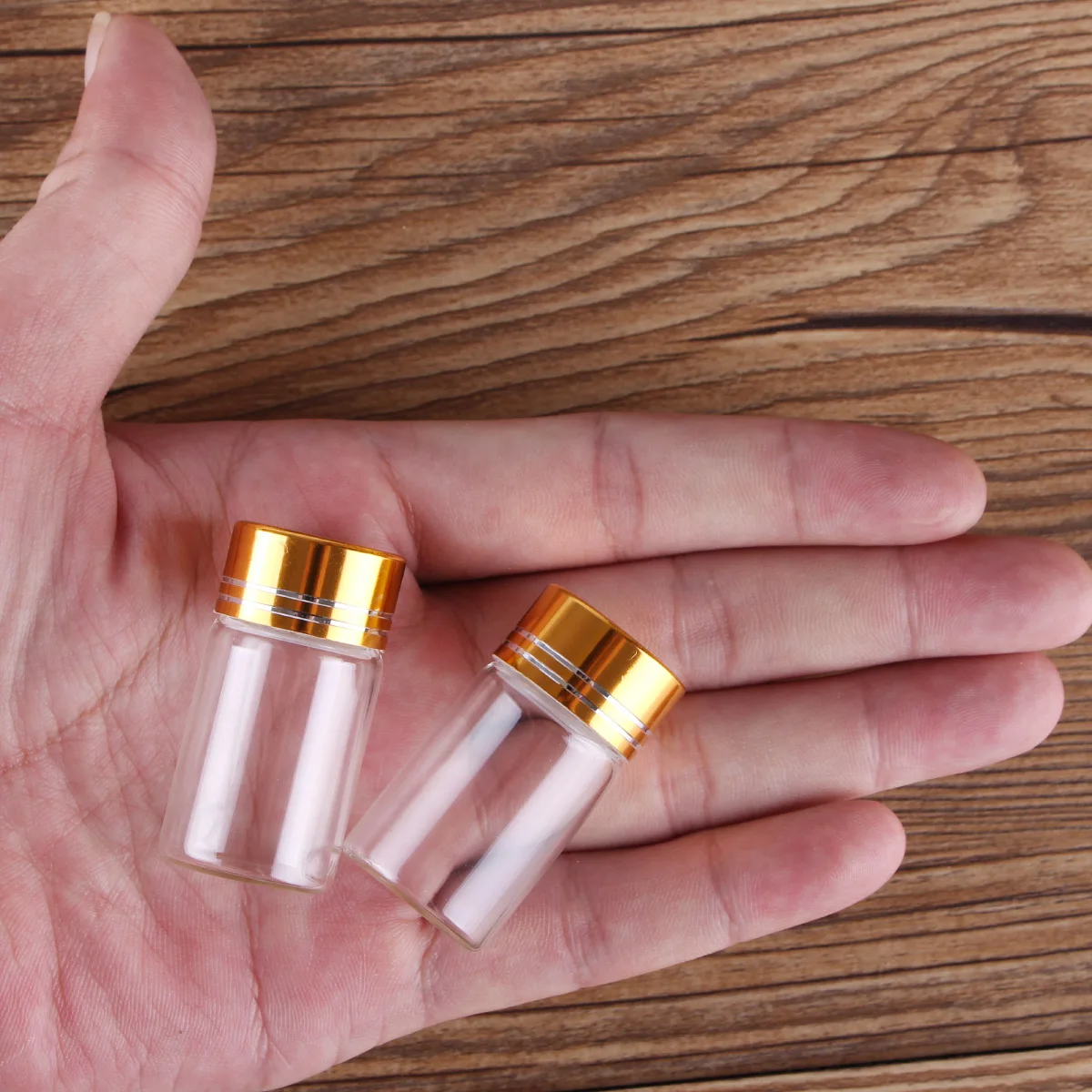 

Lots 100 Pieces 7ml Transparent Glass Bottles with Golden Caps 22*40mm Perfume Bottles Wishing Bottle