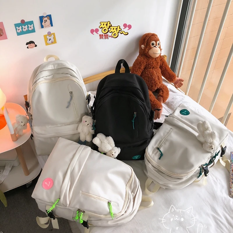 

2021 New Simple Women Rucksack Waterproof Nylon Backpacks Solid Color Unisex Schoolbag for Teenage Girls Female Travel Bags