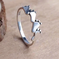 gu li fashion simple silver color cute footprints alloy ring for women party jewelry female accessories size 5 12