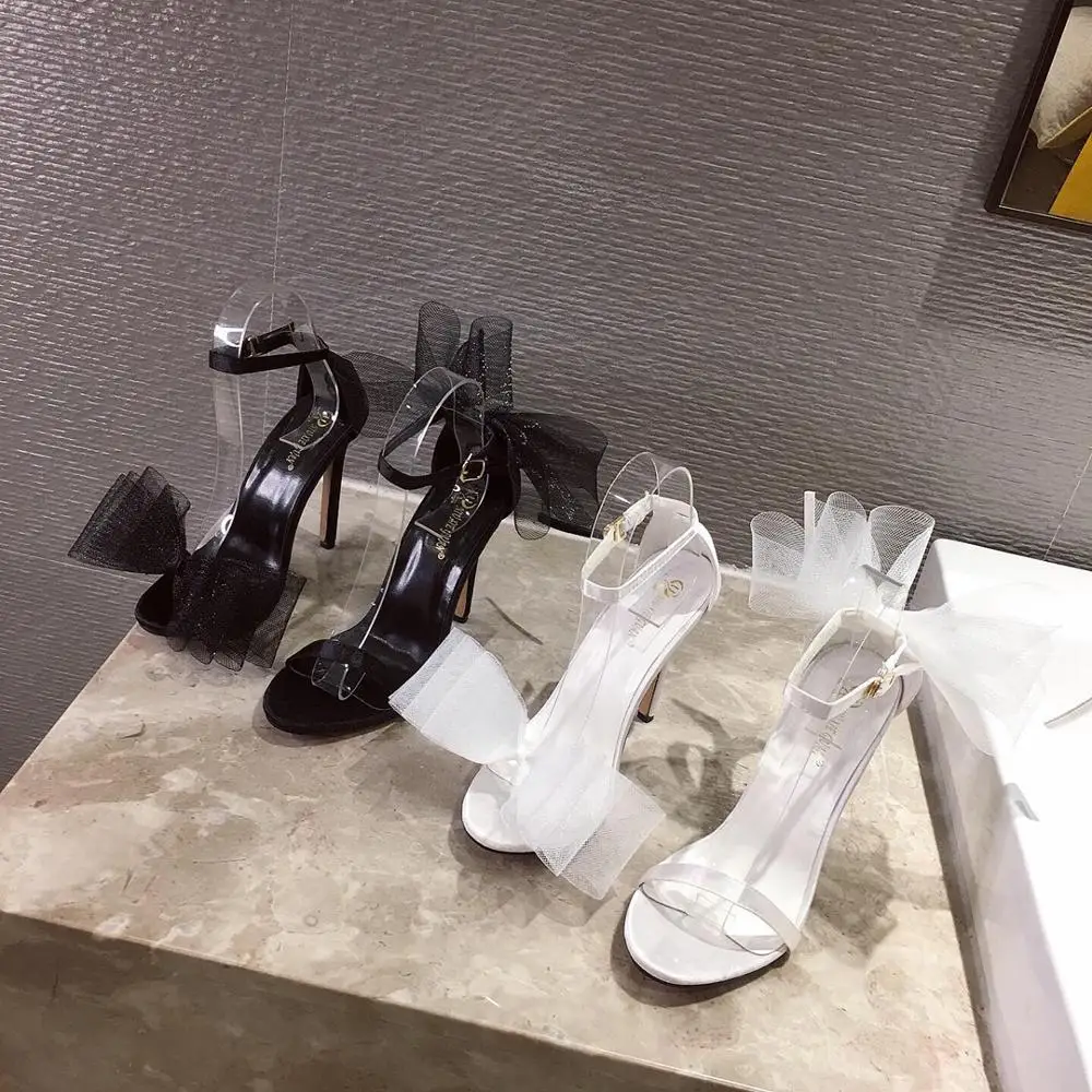 Босоножки женские на высоком каблуке с острым носком пряжкой и большим бантом |