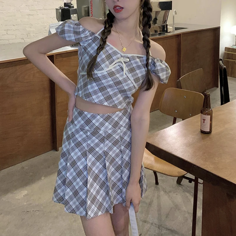 

Zoki Women Two Piece Set Casual A Line Mini Pleated Skirt Tees Plaid Tops Slash Neck Lace Up Street Wear Fashion Summer New 2021