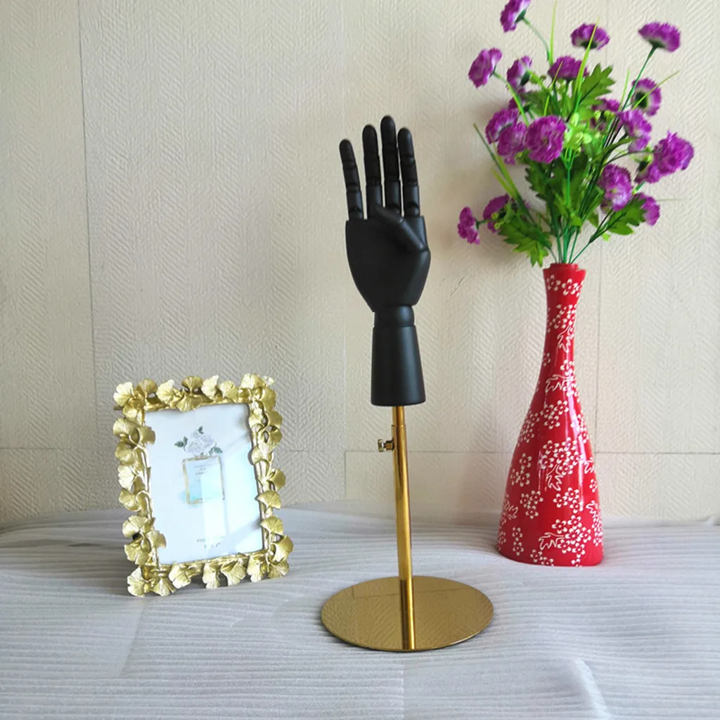 

Black Wooden Hand Display Model With Base Used For Disaply Wallet Jewelry