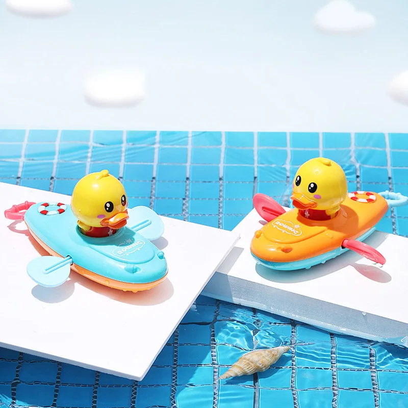 

Cartoon Duck Rowing Boat Game Funny Bathtub Floating Toy Random Color Float Swimming ABS Smooth Plastic Clockwork Bathing Toys