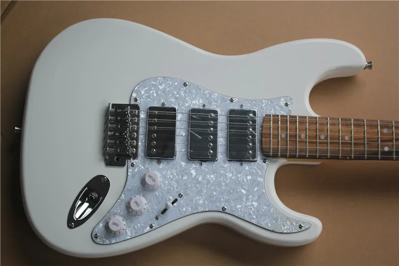 

High quality white electric guitar, white pearl guard, 3 LP pickup and maple fingerboard can be customized according to requirem