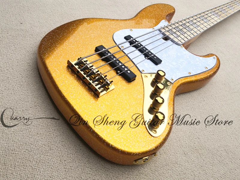 

Pre-customized electric guitar bass,5 strings bass,golden particles color,gold bridge white pearl shell pickguard,active battery