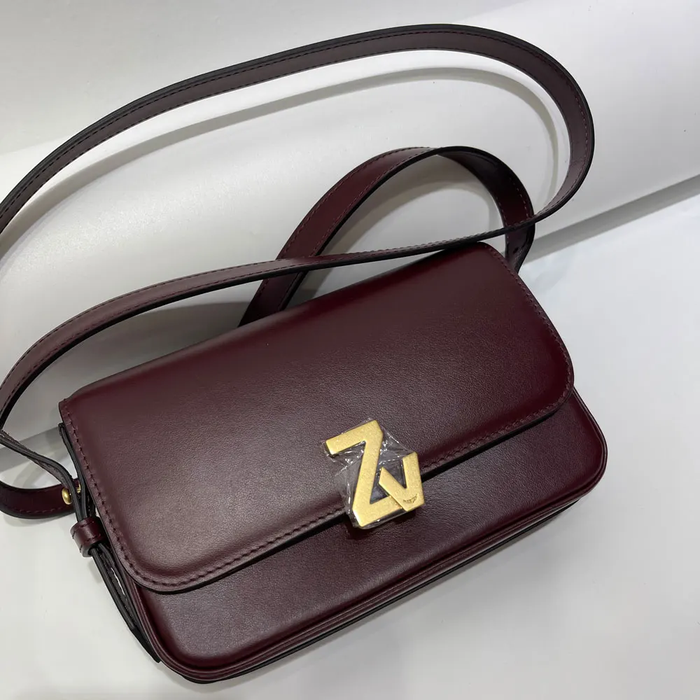 

В производстве, большая металлическая пряжка, женская черная кожаная сумка через плечо, модная женская сумка, винная зимняя женская сумка