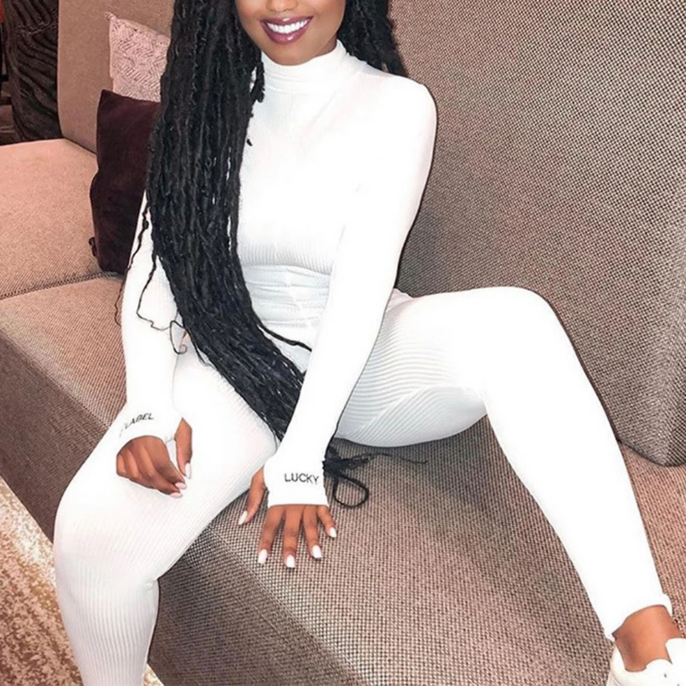 Женский трикотажный комбинезон Облегающий в рубчик с высоким воротником и