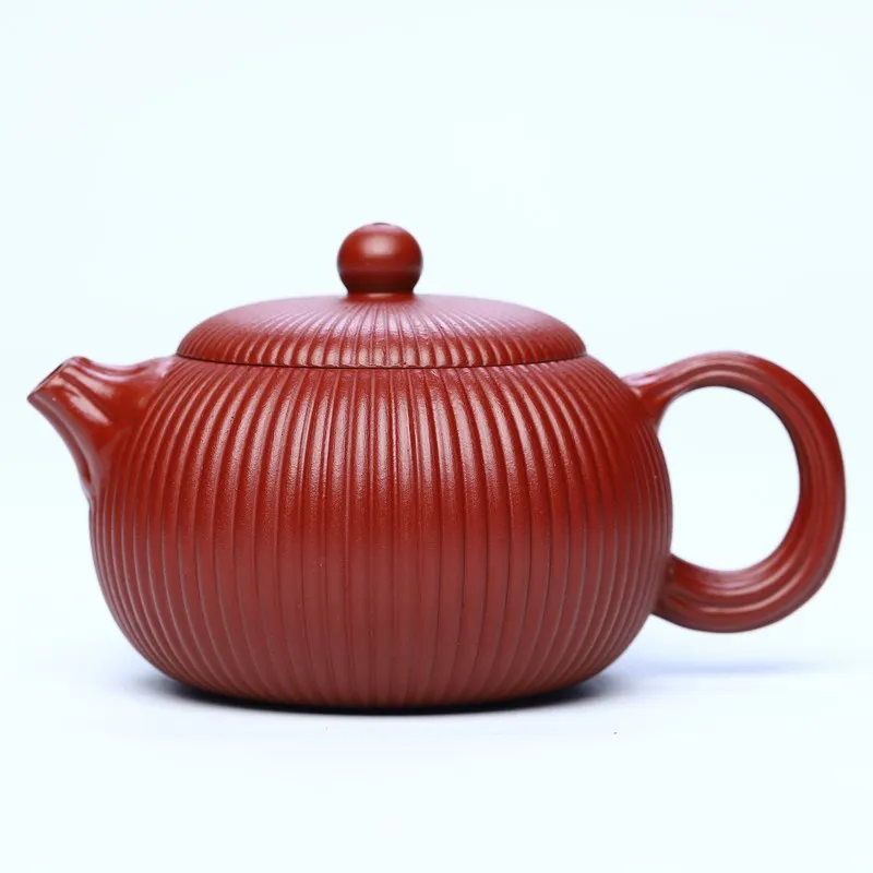 

Yixing purple clay teapot Dahongpao brocade bag Begonia Xishi teapot
