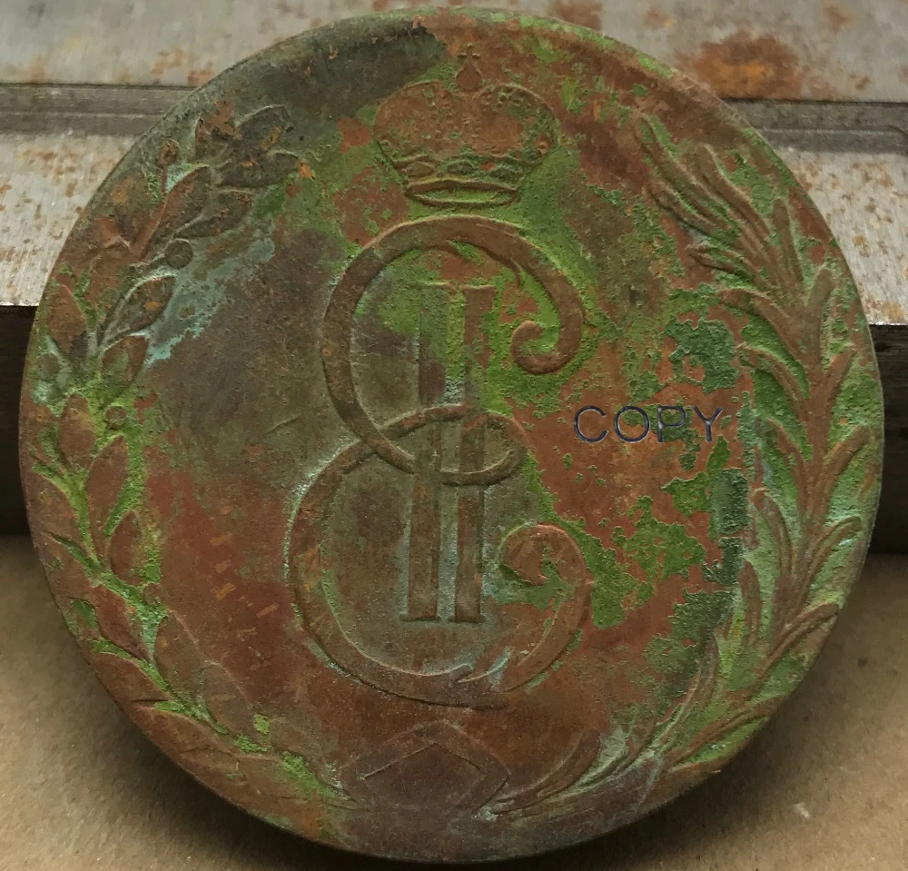 Красная медная копировальная монета 10 копеек км с левым коническим краем