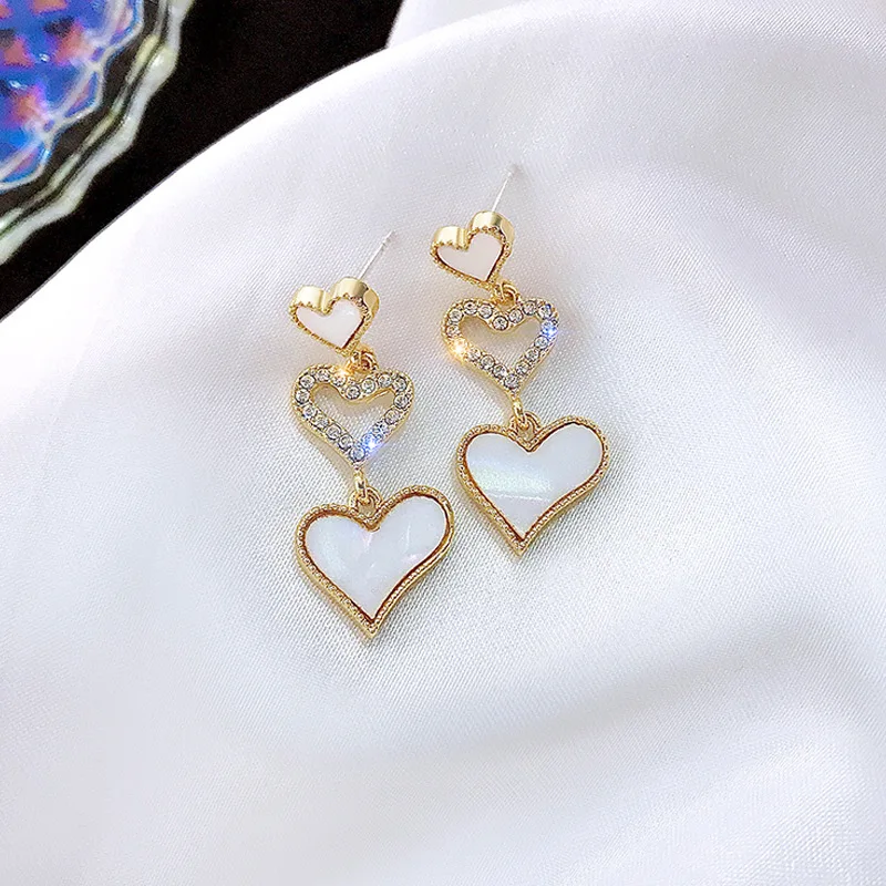 

2021 French style shell love earrings personality wild earrings temperament Korean net red earrings gift