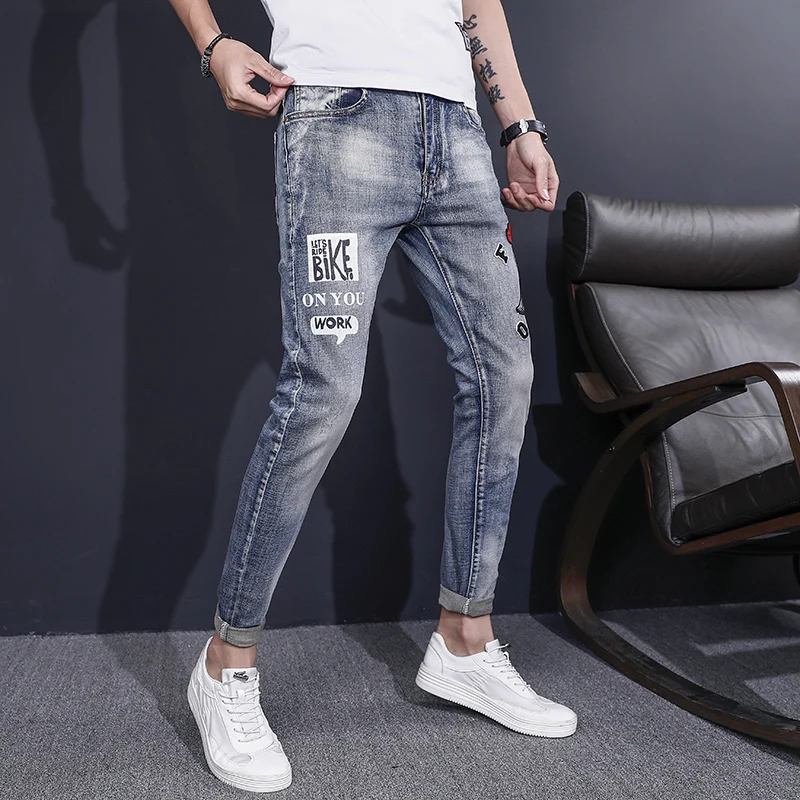 Весенние и осенние мужские джинсы с принтом в европейском американском стиле