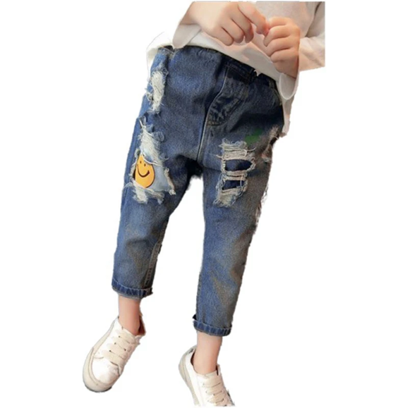 

Boys and girls spring and autumn jeans cartoon smiley hole trousers mid-waist elasticated belt thick straight trousers