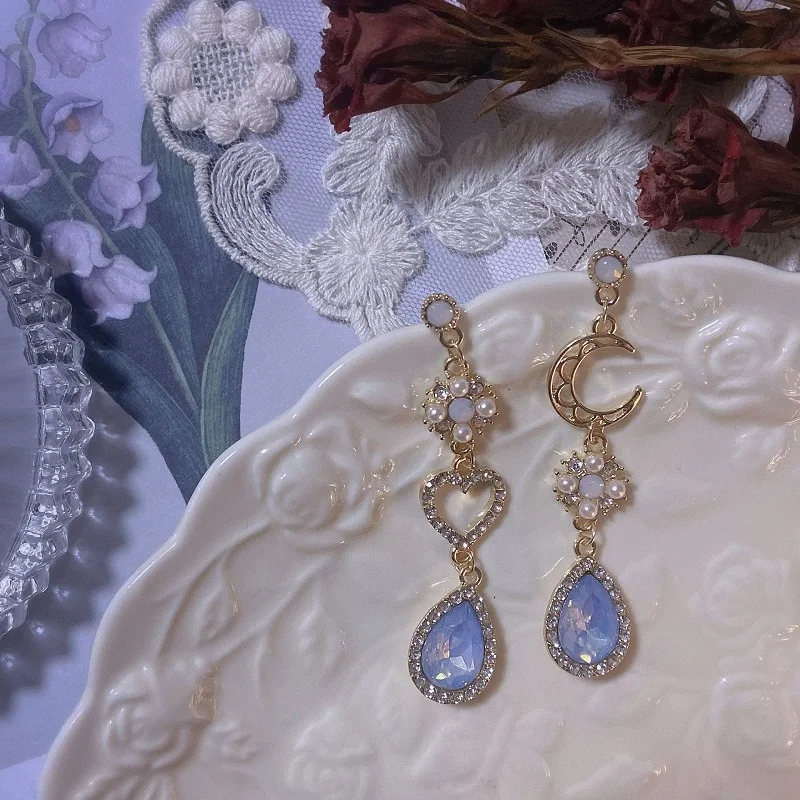 

Уникальные серьги-подвески с голубыми кристаллами для свадебной вечеринки