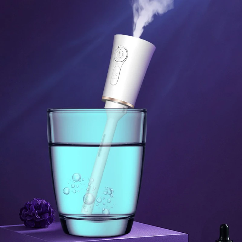 

Small Waist Waist Water Replenishing Instrument 2 in 1 Nano Spray Evaporating Face Instrument Portable Humidifier USB