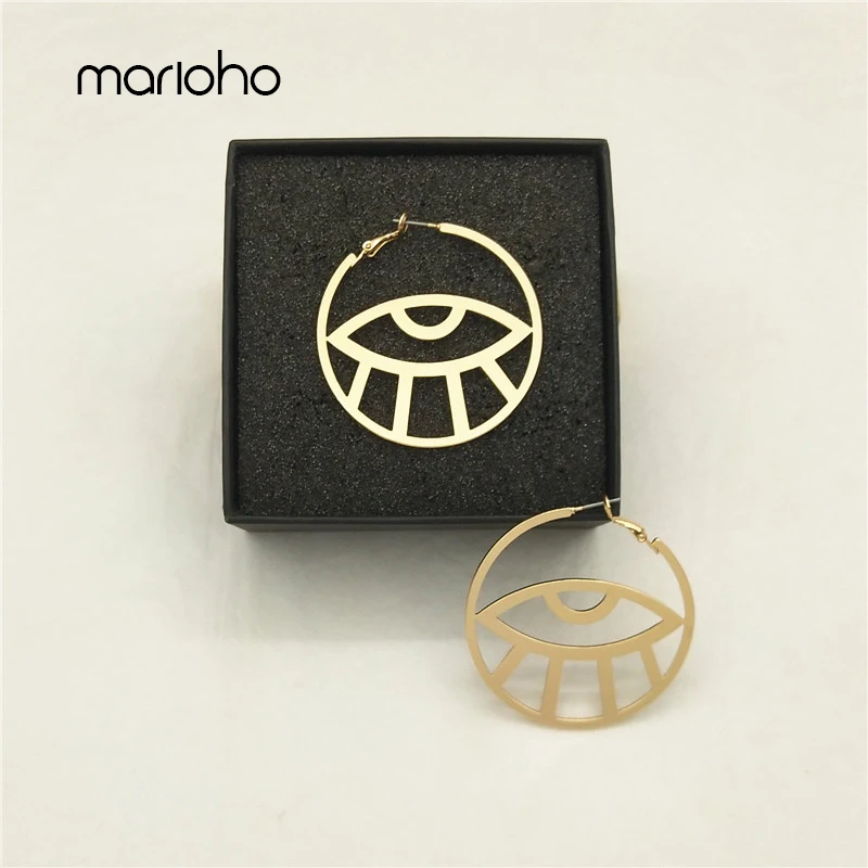 Модные серьги-кольца в абстрактном стиле с большими круглыми глазами золотого и