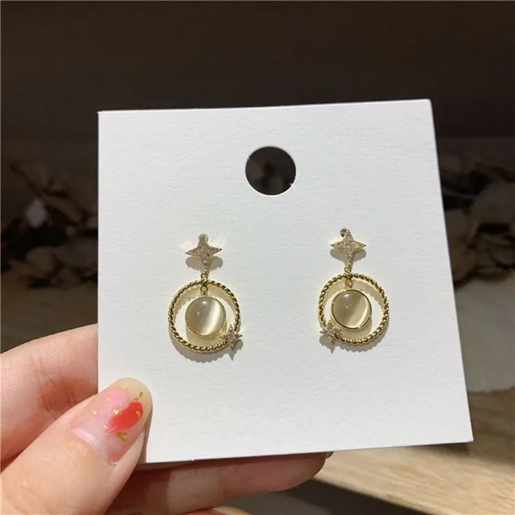 

Four-awn star opal earrings women's fashion temperament tide diamond earrings