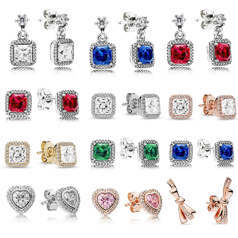 Женские серьги гвоздики серебряного цвета с кристаллами и