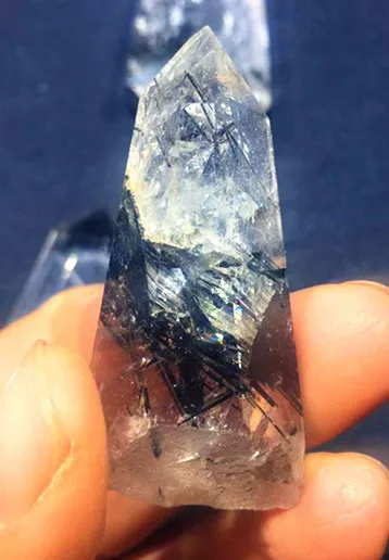 

Natural quartz crystal black hair magic wand point healing. Chakras