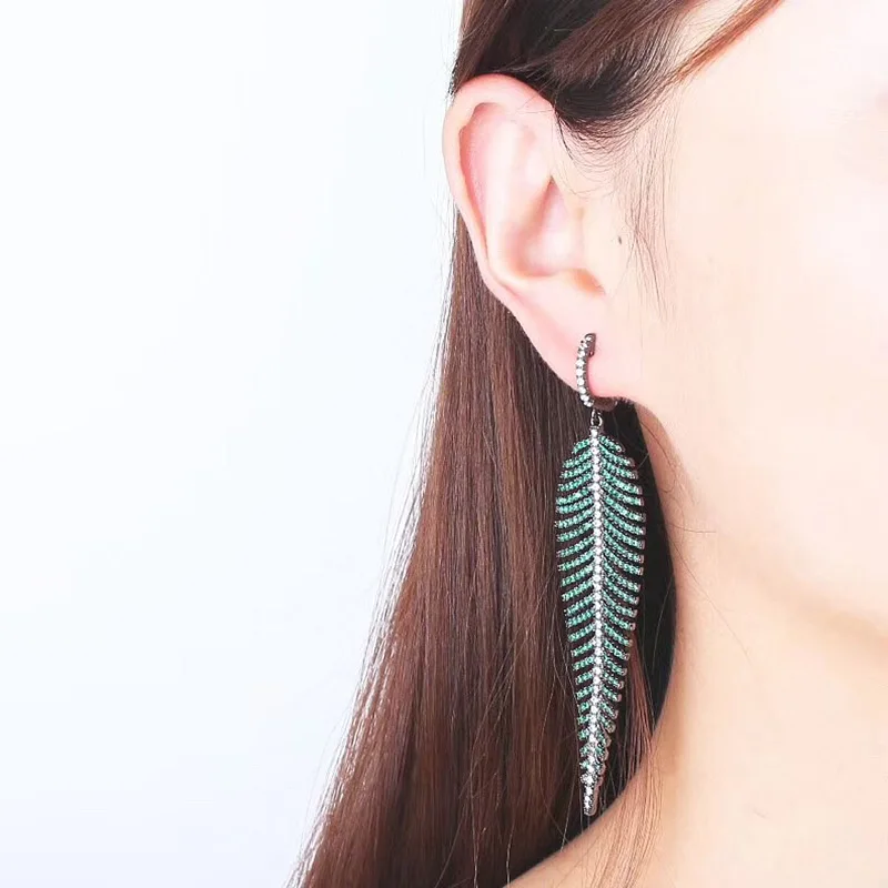 

Europe and the United States luxury exaggerated earrings new feather earrings earrings leaf color high-grade zircon earrings