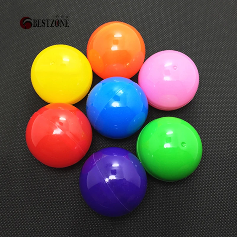 Разноцветные пластиковые игрушечные капсулы 100 шт./лот диаметром 40 мм, круглый шар для торгового автомата, пустой контейнер, оболочка для де... от AliExpress WW