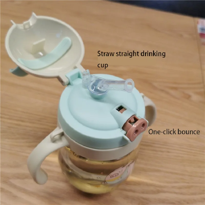 

Cute piggy drinking cup plastic cup with water bottle children's straw cup with handle PC material with gravity ball