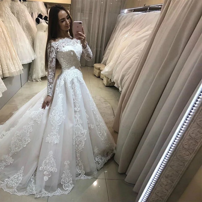 

Luxury Blush Pink Wedding Dresses Princess Off The Shoulder Short Sleeves Lace Appliqued Chapel Train Bridal Gowns Custom Made