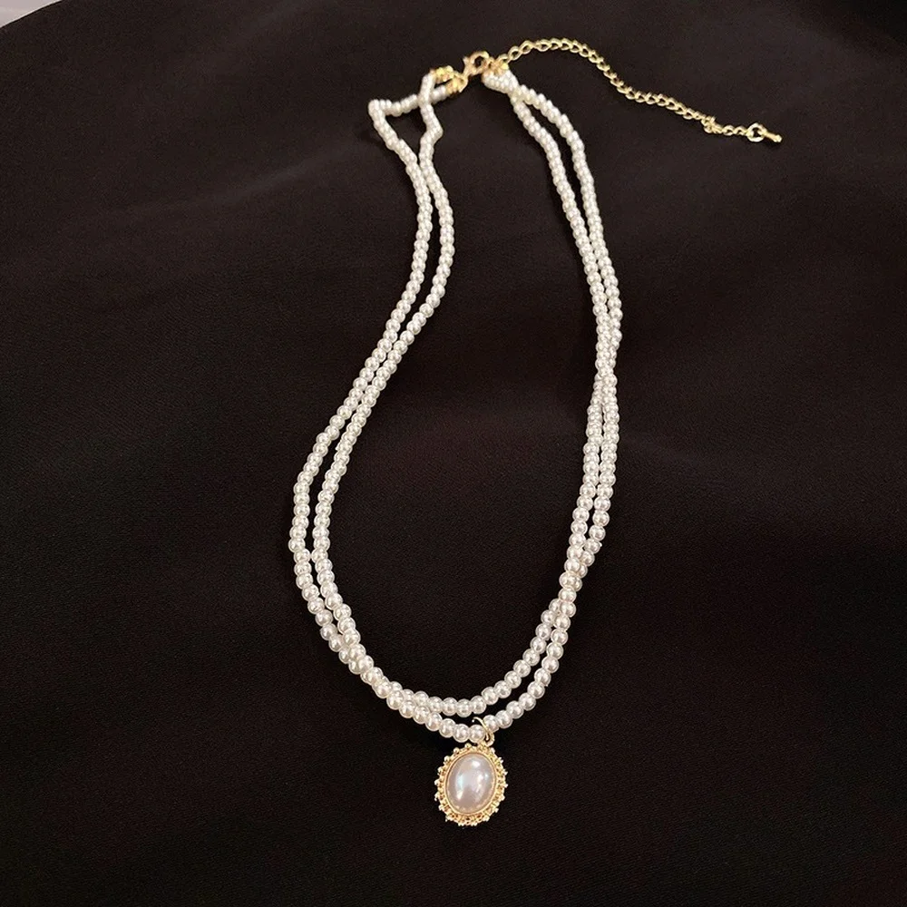 

Япония и Южная Корея новый элегантный двухместный жемчуг ожерелье геометрический Овальный Кулон банкетное платье короткая цепочка на ключ...