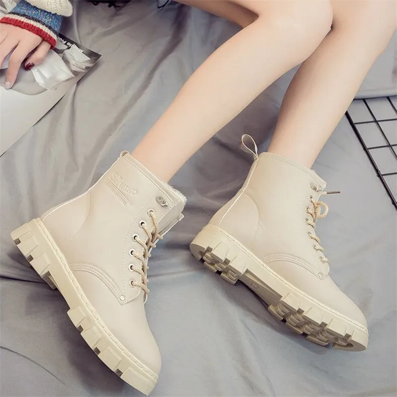 

Winter boots female new high help wild plus velvet warm in the tube round head with non-slip women booties Casual women's shoes
