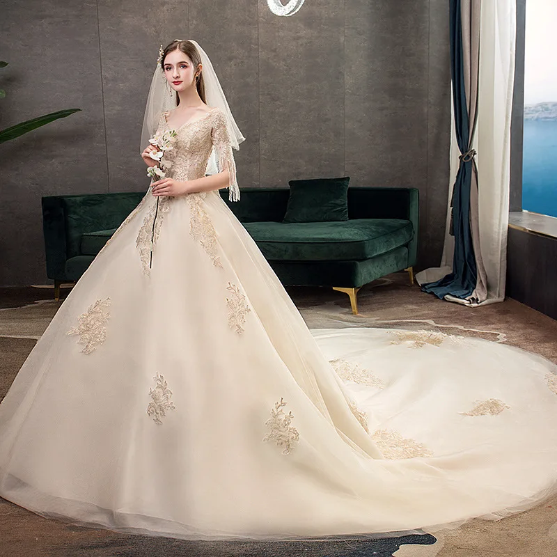 Koop Trouwjurk 2021 Elegante V-hals Half Sleeve Bruidsjurken Champagne Kant Met Trein Plus Size Bruid Jurk Vestido De Noiva