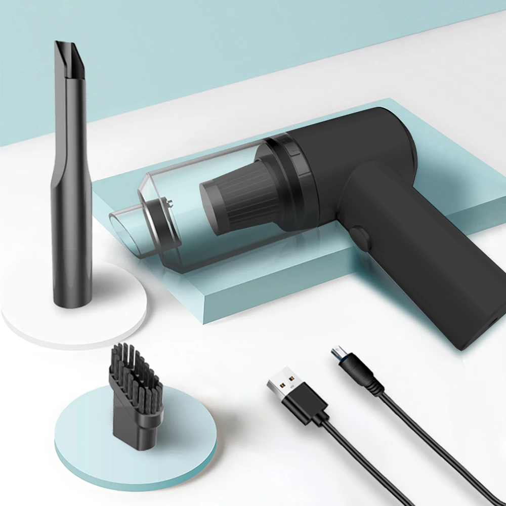 Портативный мини пылесос для автомобиля и компьютера с USB-подключением и насадками для удаления пыли с клавиатуры и экрана.